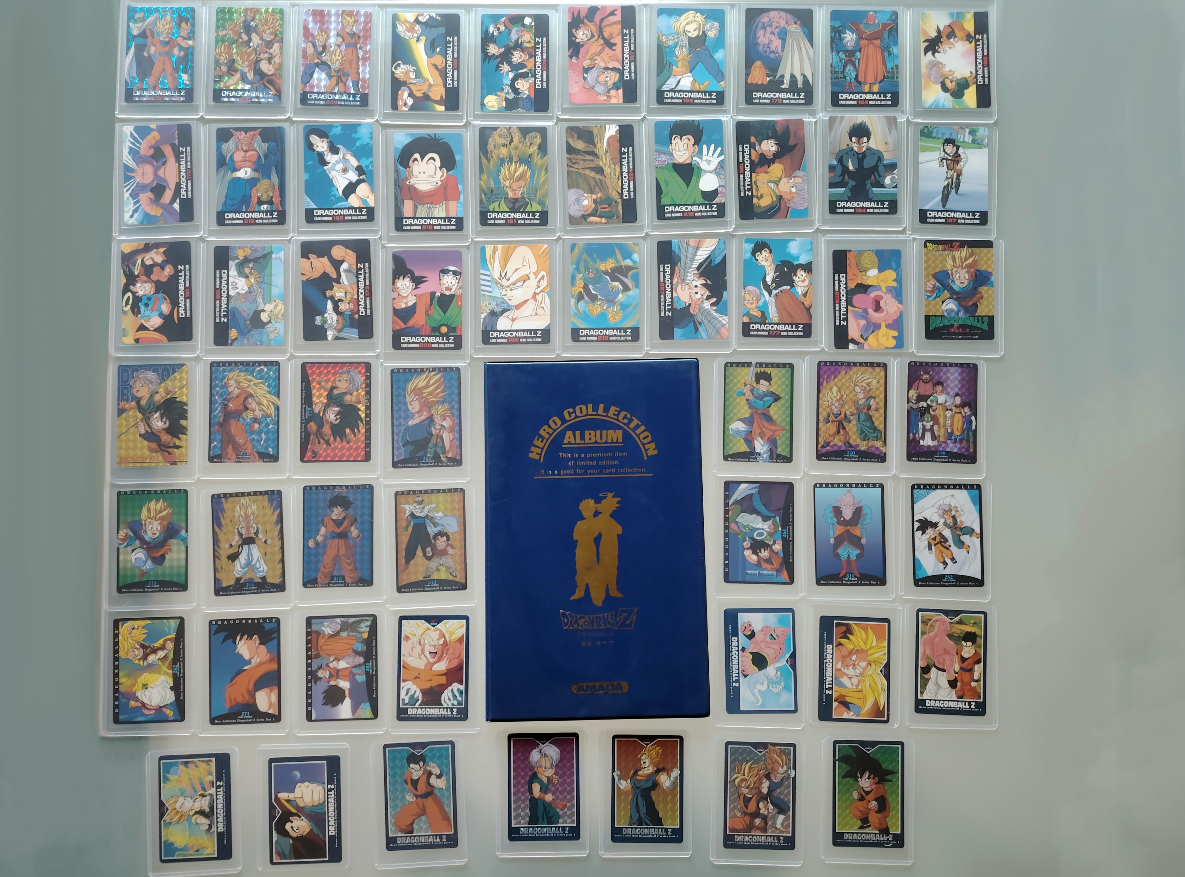 Set of 57 Dragon Ball Hero Collection cards + 1 binder (1994 - 1995)